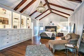 The size of your room will determine what size bed you can comfortably fit in your bedroom, as well as how many additional pieces of furniture you can add. 75 Primary Bedrooms With Hardwood Flooring Photos