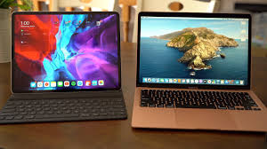 News Apple Featured Apple S 2020 Macbook Air Vs 2020 Ipad Pro Macbook Macbook Air Macbook Case Stickers