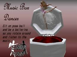 Stylish and young fashion blonde giving the rock and roll sign and holds a tape recorder on her beautiful female ballet dancer on a music box made from gingerbread with christmas tree on background. Second Life Marketplace N N Music Box Dancer