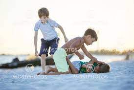+ янг бойз янг бойз до 21 года bsc young boys u18 bsc young boys u17 bsc young boys u16 bsc young boys uefa u19 bsc young boys jugend. Young Boys Fighting On Beach By Photobac Mostphotos