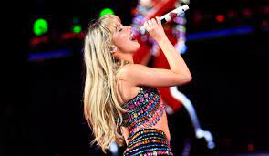 Sabrina Carpenter Glitters in Naked Wolfe's Platform Boots in Brazil for  Taylor Swift's 'Eras' World Tour