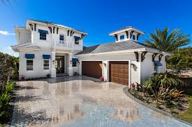 Open floor plans have dominated modern home design since they first appeared in the 1950s as part of the overall trend toward more contemporary styling. West Indies Model Home Transitional Exterior Miami By Jmdg Architecture Planning Interiors Houzz