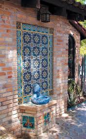 To make a striking outdoor shower look even more grand, lay a tile pathway that leads the way. Pacific Horticulture Quinta Fay Outdoor Wall Fountains Wall Fountain Indoor Fountains