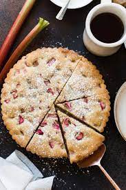 Frangipane Tart And Cake Meet Halfway In A Rhubarb Frangipane Cake This Simple Rhubarb Cake Will Quickly Bec Frangipane Cake Rhubarb Recipes Fruit Tart Recipe