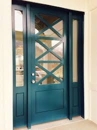 Front porch design with chippendale benches, turquoise front door and planters. Popular Front Door Paint Colors