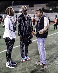 Dressed in a british khaki, sail and bright crimson color scheme. Travis Scott X Air Jordan 6 Retro Olive Of Travis Scott On The Instagram Account Thuggert Travis Scott Fashion Travis Scott Outfits Young Thug Fashion