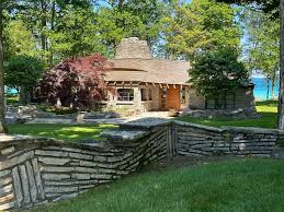 Edith Pair's thriving tours highlight Earl Young's Mushroom Houses in  Charlevoix