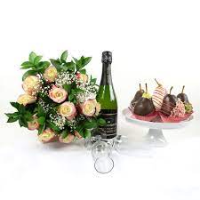 Exclusive designs made with responsibly sourced flowers. Champagne Flowers Floral Treasures Flowers Champagne Gift New York Blooms