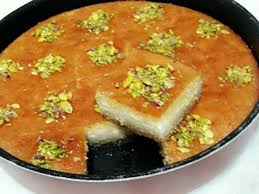 بسبوسة محشية قشطة بالصور من Memoo Recipe Cooking Recipes Desserts Arabic Sweets Recipes Food Videos Desserts