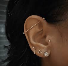 To treat it at home, use topical antibioitcs, a saline solution, and don't remove the piercing. How To Treat Infected Ear Piercings A Dermatologist Explains