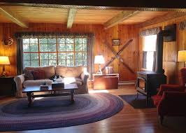 Knotty pine walls with wood floors. Alicia And Her Husband Restore The Knotty Pine In Their 1955 Cabin So Inviting