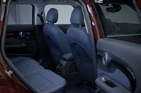 The Surprisingly Spacious Interior Of The Reimagined Mini Clubman Featuring Chesterfield Leather In Indigo Just One Of The Ma Mini Clubman Clubman Mini Usa
