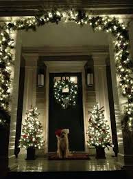 Garland Around The Entry Rather Than Across The Porch Railings Outdoor Christmas Decorations Christmas Decor Inspiration Christmas Lights