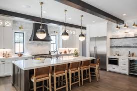 This video shows you exactly how i repainted my old varnished oak kitchen cabinets. 4 Kitchens With White Cabinets And A Wood Island