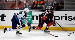 The anaheim ducks and new jersey devils came out of nowhere with the second big trade of the nhl season by swapping defenseman sami vatanen and center adam henrique on thursday. Devils Acquire Defenseman Sami Vatanen From Ducks For Adam Henrique The Denver Post