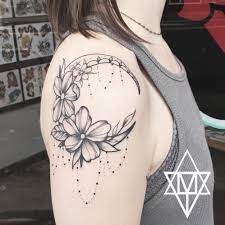 Stipple Moon Tattoo With Flowers Shoulder Tattoos For Women Tattoos Thigh Tattoos Women