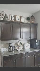 11 Latest Kitchen Cabinet Decor Photos In 2020 Decorating Above Kitchen Cabinets Kitchen Cabinets Decor Above Kitchen Cabinets