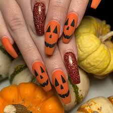 Nail art decoration with rhinestones and glitter. 23 Most Beautiful Halloween Acrylic Nails Stayglam