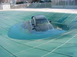 Car On Dura Mesh Ii Safety Cover Safety Cover Pool Cover Swimming Pool Safety