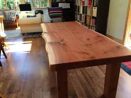 The l ive edge table is warm and inviting. Lovely Live Edge Redwood Table Live Edge Table Table Rustic Dining Table