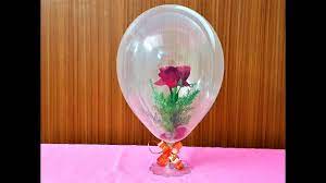 Balloons with lights and flowers inside. See How We Put Flower Inside A Balloon Youtube