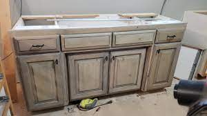 So glad that we went the extra mile in the kitchen and had all of the knotty alder smoothed out for paint! These Are The Grey Stained Knotty Alder Cabinets In Our Kitchen I Have Been Working On Painting The Dining Room Cabinets Was A Lot Easier Renovations