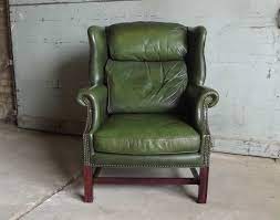 Vintage wing back armchair in distressed green leather. Pin On Even More Home Stuff