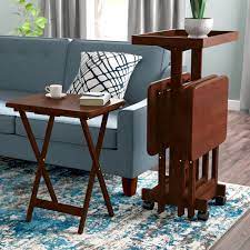 A tv tray table, tv dinner tray, or personal table is a type of collapsible furniture that functions as a small and easily portable, folding table. Casters Tv Trays You Ll Love In 2021 Wayfair