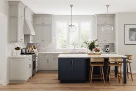 Light Grey Kitchen with Dark Blue Island - Crystal Cabinets