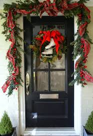 38 Stunning Christmas Front Door Decor Ideas Digsdigs Front Door Christmas Decorations Christmas Door Decorations Christmas Front Doors