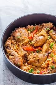 This Easy Gluten Free Jollof Chicken Rice Is Made With Chicken Tomatoes Peppers And Rice African African Food African Recipes Nigerian Food African Cooking