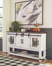 Place your wine bottles in the center bottle rack for quick access. Valebeck White Brown Dining Room Server On Sale At American Furniture Of Slidell Serving Slidell La