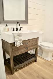 This is a small angled vanity with a sink and faucet, a small counter, and a bathroom mirror. 10 Cool Modern Farmhouse Bathroom Vanity Trend Bathroom Layjao