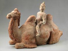 A finely painted pottery figure of a bactrian camel and rider. 85 Tang Camels Ideas Camels Tang Chinese Pottery
