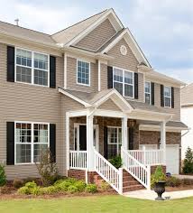 Take a small step to change your exterior by painting your front door an accent color, such as red or black. Best Exterior House Color Schemes Better Homes Gardens