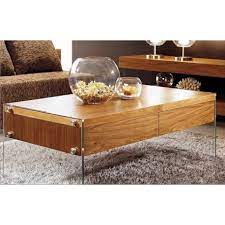 This exotic coffee table is made of reclaimed wood, which means that every piece of furniture is unique and slightly different from the next. Central I Bespoke Coffee Table With Glass Legs Coffee Tables 568 Sena Home Furniture