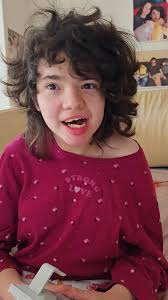 Daddy daughter dancing at Sukkot festival