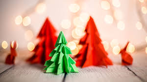 Use a ruler to measure halfway between the top and bottom of each tree shape. 10 Christmas Origami Projects