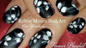 Nail art essie x kate spade fall fashion week nail art recreate the trail of sparkle from kate spade's fall fashion look Matte Black And White Flower Nails Diy Floral Nail Art Design Tutorial Nail Art Designs Diy Best Nail Art Designs Floral Nails