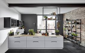 Unit with open drawers finished in sundried old spruced wood. The Industrial Look For Kitchens Nolte Kuechen Com