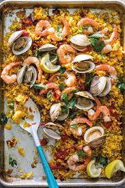 Oven Paella With Chorizo Clams And Shrimp Recipe Paella Recipe Seafood Paella Recipe Paella
