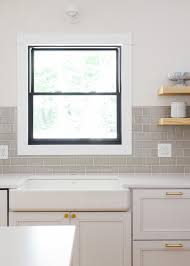 All you need is a piece of tempered glass, which is sturdy and safe to use over a hot stove, and spray paint in any color you'd like. How To Install A Backsplash The Budget Decorator