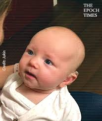 It's hard to feel like much is wrong in the world when you're looking into  the lovely eyes of a baby.
