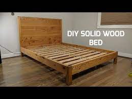 looking to save by building your own bed frame check out over 200 well organized easy tutorials that will h diy bed frame easy diy bed frame solid wood bed