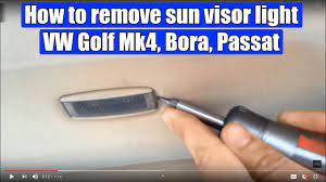 Pull wiring harness which is bonded to moulded headliner towards front. How To Remove Sun Visor Light Vw Golf Mk4 Bora Passat In 2 Steps Youtube