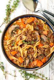 Browned ground beef is simmered with garlic and condensed cream of mushroom soup, then mixed with prepared egg noodles and sour cream. Beef Burgundy Mushroom Soup Beef Mushroom Soup Recipe
