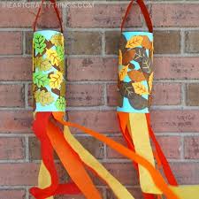 I stuck them on a oatmeal cardboard cylinder that i covered in white sheet labels. Fall Windsock Craft For Kids Easy Fall Craft For Preschoolers I Heart Crafty Things