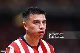 Cesar Arturo Ramos central referee shows a yellow card during the... News  Photo