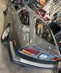 Image result for Gray 1981 Alfa-Romeo