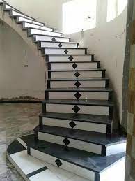To ensure the safety of the residents, the handrail is essential and the choice in stainless steel enhances the dark color. Awesome Granite Staircase Designs To See More Visit Staircase Railing Design Stairway Design Stairs Design Interior